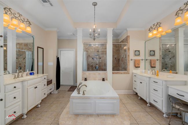 Amazing primary bath area and separate shower with gorgeous ceiling. | Image 29