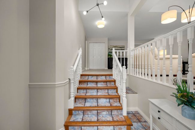 Staircase featuring baseboards | Image 5