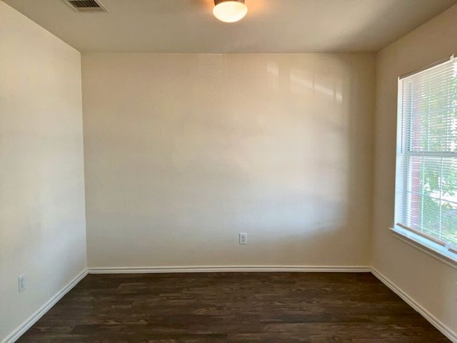 Dining room with baseboards and dark wood- style floors | Image 8