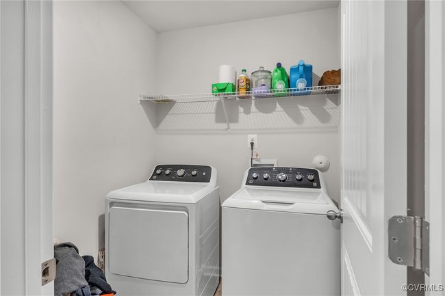 Laundry area featuring washer and clothes dryer and laundry area | Image 15