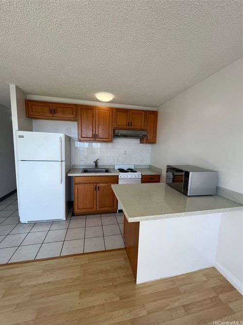 614-3045 Ala Napuaa Pl, Honolulu, HI, 96818-2710 | Card Image