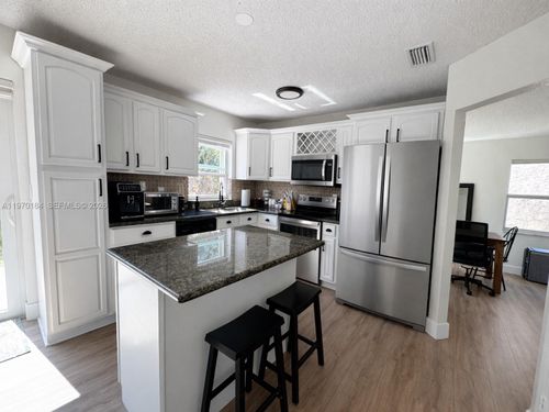 10708 12th Mnr, Plantation, FL, 33322-6995 | Card Image