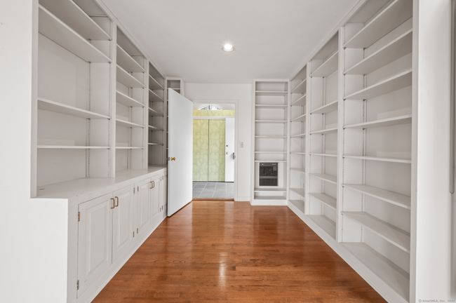 Built-ins door lead to Foyer. | Image 7