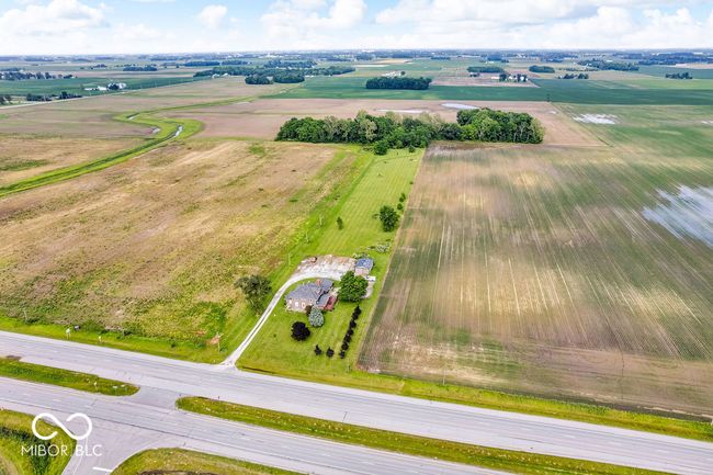aerial view of sparsely populated area with abundant farmland | Image 54