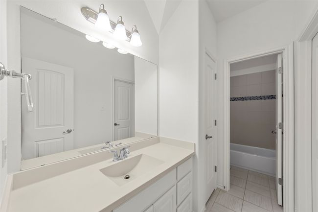 Bathroom featuring vanity and tile patterned flooring | Image 31