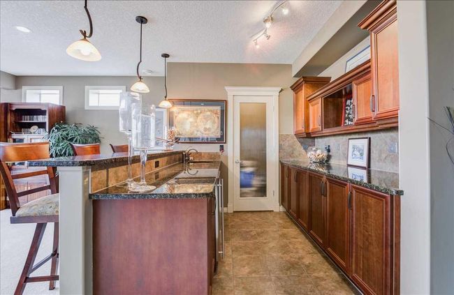 22 Tuscany Estates Crescent Nw, Home with 3 bedrooms, 2 bathrooms and 4 parking in Calgary AB | Image 40