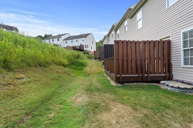 Level yard with green views. | Image 29