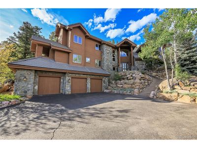 3864 Valley Dr, House other with 4 bedrooms, 3 bathrooms and null parking in Evergreen CO | Image 3