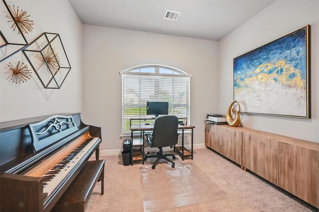 Office area with light carpet and baseboards | Image 6