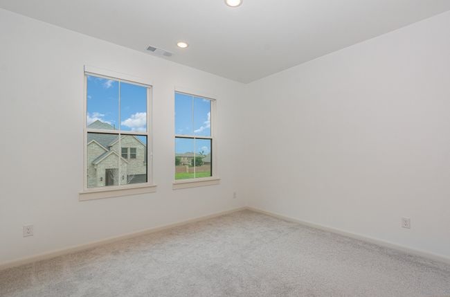Carpeted spare room featuring recessed lighting and baseboards | Image 25