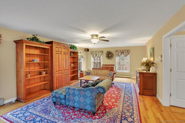 Front to back living room with sliding door to rear deck | Image 8