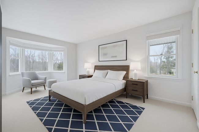 Bedroom featuring baseboards and carpet floors. Digitally Staged | Image 6