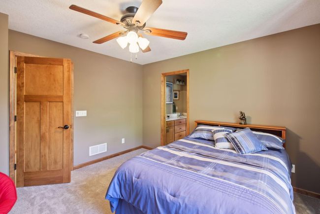 Matching upper-level bedrooms are joined by Jack & Jill bathroom | Image 17