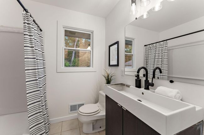 Remodeled main level bathroom. | Image 10