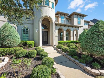 Curb appeal leading to your front porch. Imagine adding a hanging swing in your front porch. | Image 2