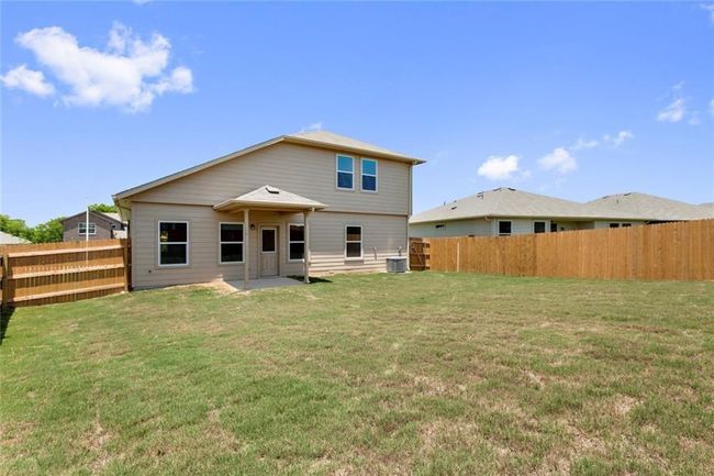 Back of house with cooling unit | Image 24