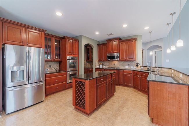 Another view of the kitchen. | Image 17