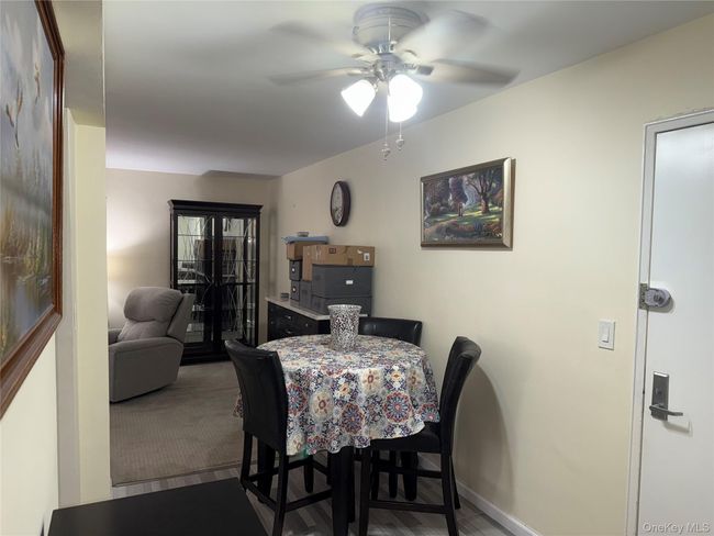 Dining room featuring baseboards and a ceiling fan | Image 8