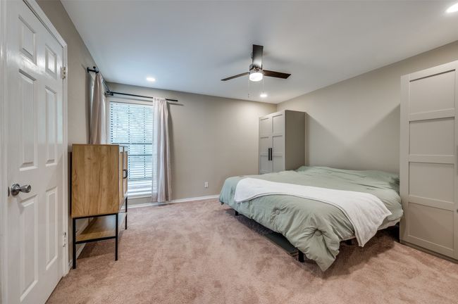 Bedroom with light carpet, recessed lighting, a ceiling fan, and baseboards | Image 7