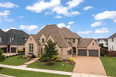 View of front of property featuring 4 garages | Image 1