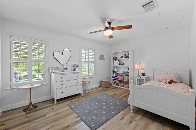 Comfortable and well-sized secondary bedrooms with great closet space and natural light. | Image 13