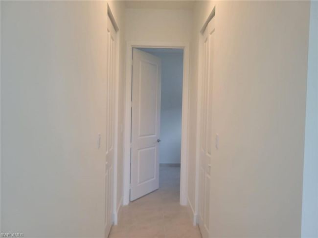 Corridor with light tile patterned floors | Image 10