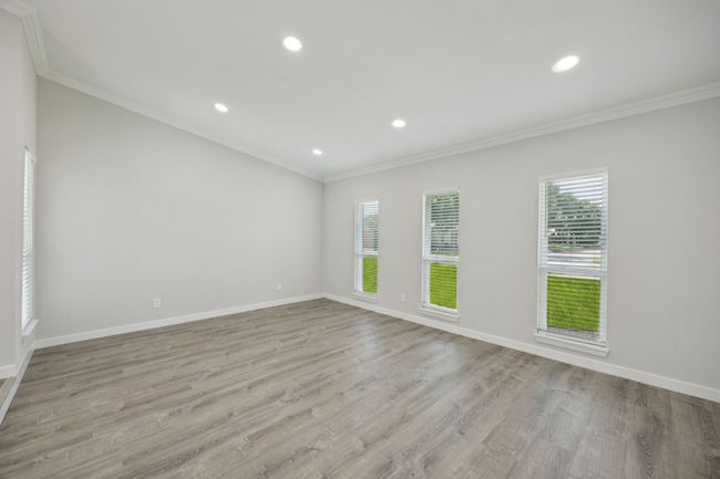 The living has NEW recessed lighting as well as NEW windows and stylish flooring. | Image 9