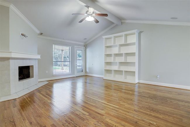 Great room with wood burning fireplace | Image 14