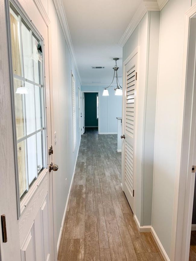 Hallway View from bedroom 2 toward bedroom 1 | Image 19