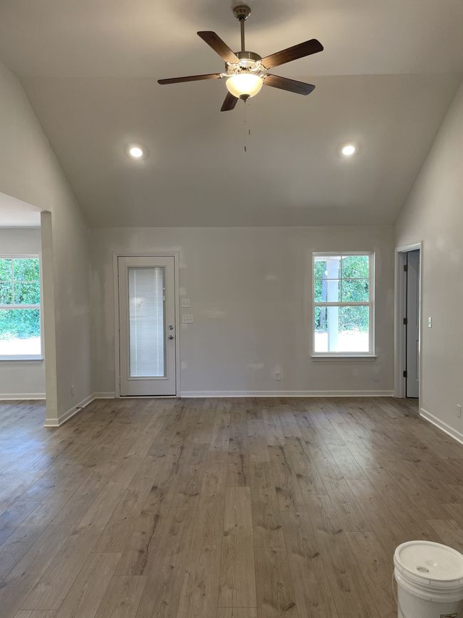 Open living room, kitchen, and dining space | Image 5