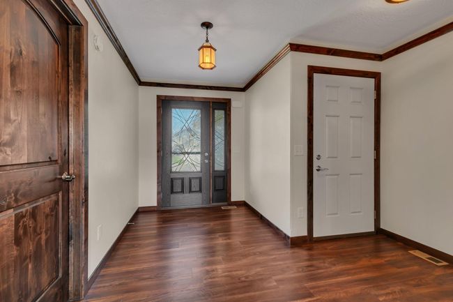 Entryway with crown molding | Image 22