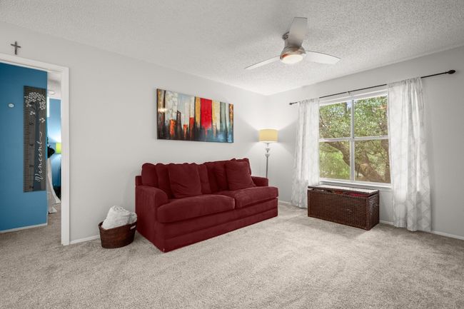 The upstairs game room offers endless possibilities, with its open layout that can easily transform into a media space, play area, or music or art studio to suit your lifestyle | Image 20