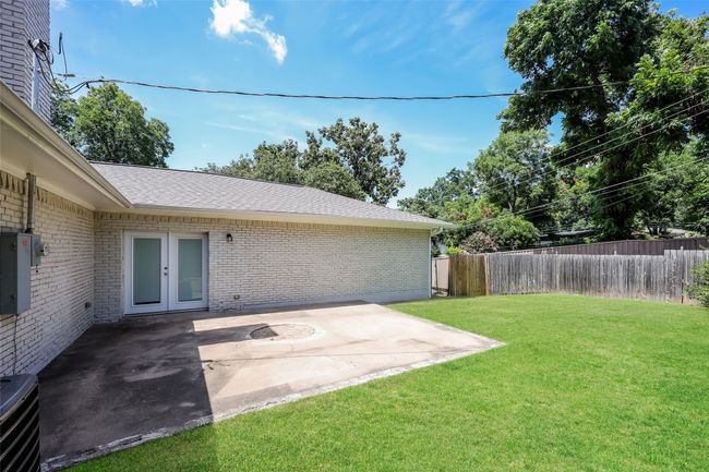 View of yard featuring a patio and french doors | Image 25