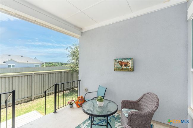 Covered back patio. | Image 30