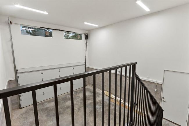 High ceiling garage with potential for additional storage or LIFT | Image 33