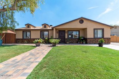 3613 E Surrey Avenue, House other with 4 bedrooms, 2 bathrooms and null parking in Phoenix AZ | Image 1