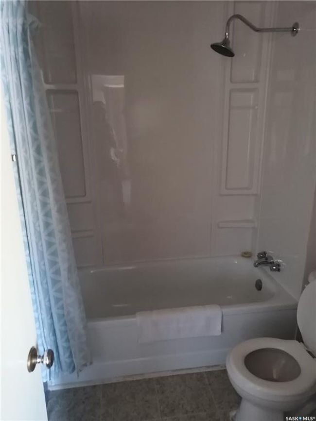 Full bathroom featuring shower / tub combo | Image 36
