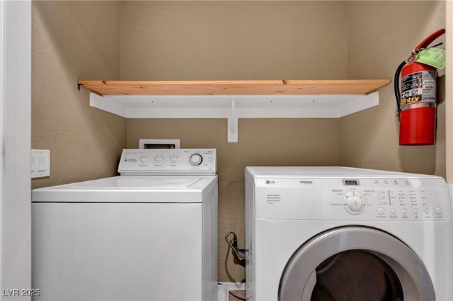 Laundry room featuring washer and dryer | Image 22
