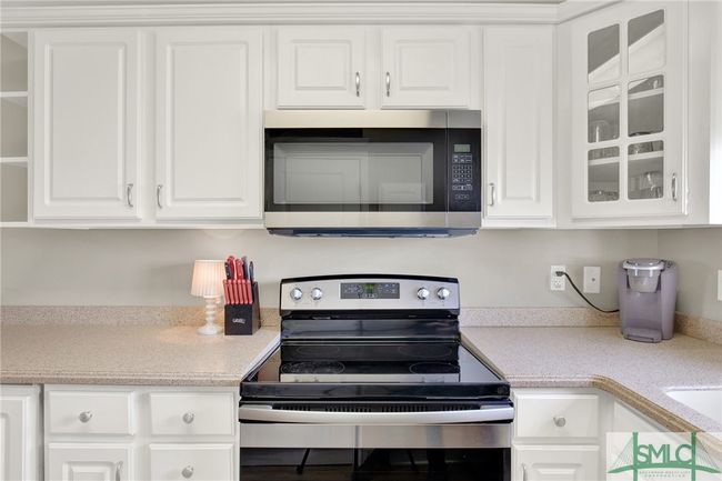Updated Kitchen with Stainless Steel Appliances & Breakfast Bar | Image 14