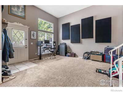 Welcome in to the main living room with high ceilings | Image 3