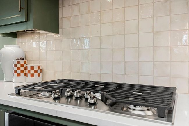 Kitchen with island and walk in pantry. Photos of previous model home. Not actual listing. Features and sizes may vary. Contact agent for details & showings! | Image 10