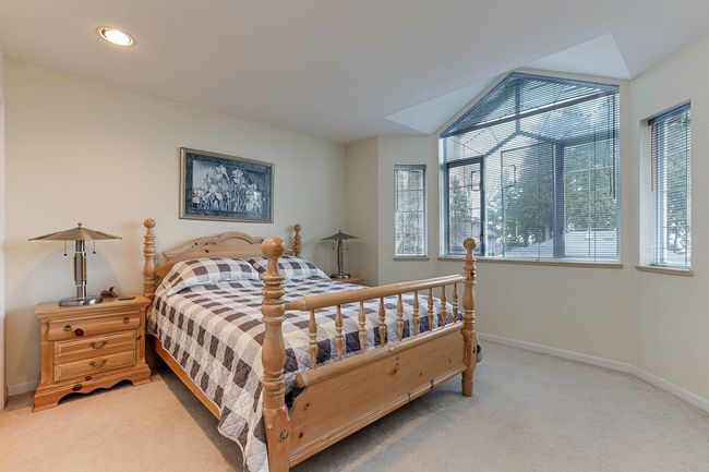 Carpeted bedroom with recessed lighting and baseboards | Image 31