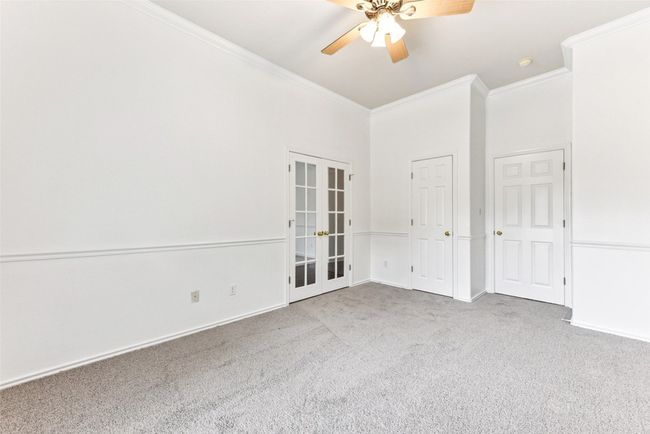 Another view of office/bedroom with newly installed carpet and fresh paint | Image 9