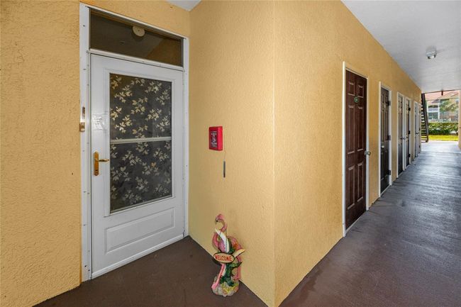 Hall with storage closets | Image 21