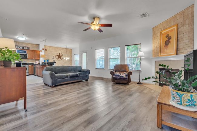 View of the living room from the foot of the stairs | Image 12