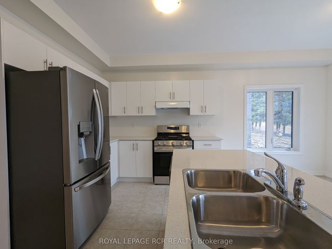 7 Lawrence D Pridham Avenue, House other with 4 bedrooms, 3 bathrooms and 3 parking in New Tecumseth ON | Image 4