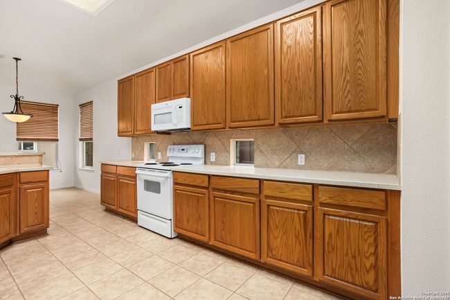 10406 Canyon Riv, House other with 4 bedrooms, 3 bathrooms and null parking in Helotes TX | Image 14