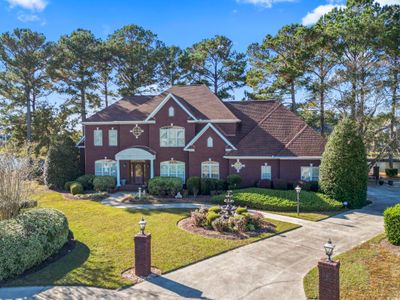 View of front facade featuring a front lawn | Image 1