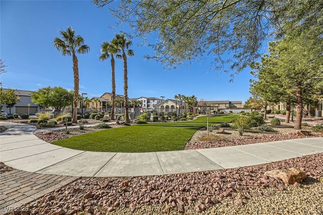 Surrounding community with a residential view and a lawn | Image 17