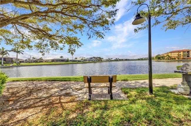 Water view with nearby suburban area | Image 39